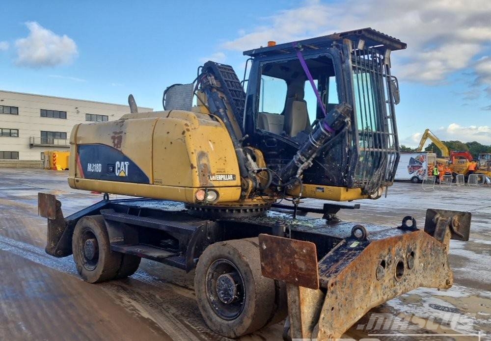 CAT M 318 Hjulgrävare