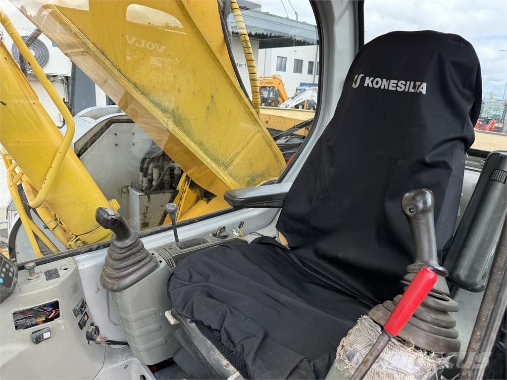 New Holland E235SRLC Гусеничні екскаватори