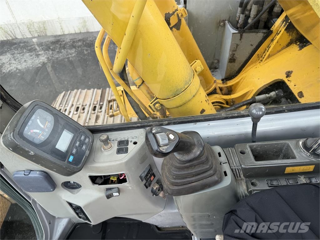 New Holland E235SRLC Гусеничні екскаватори