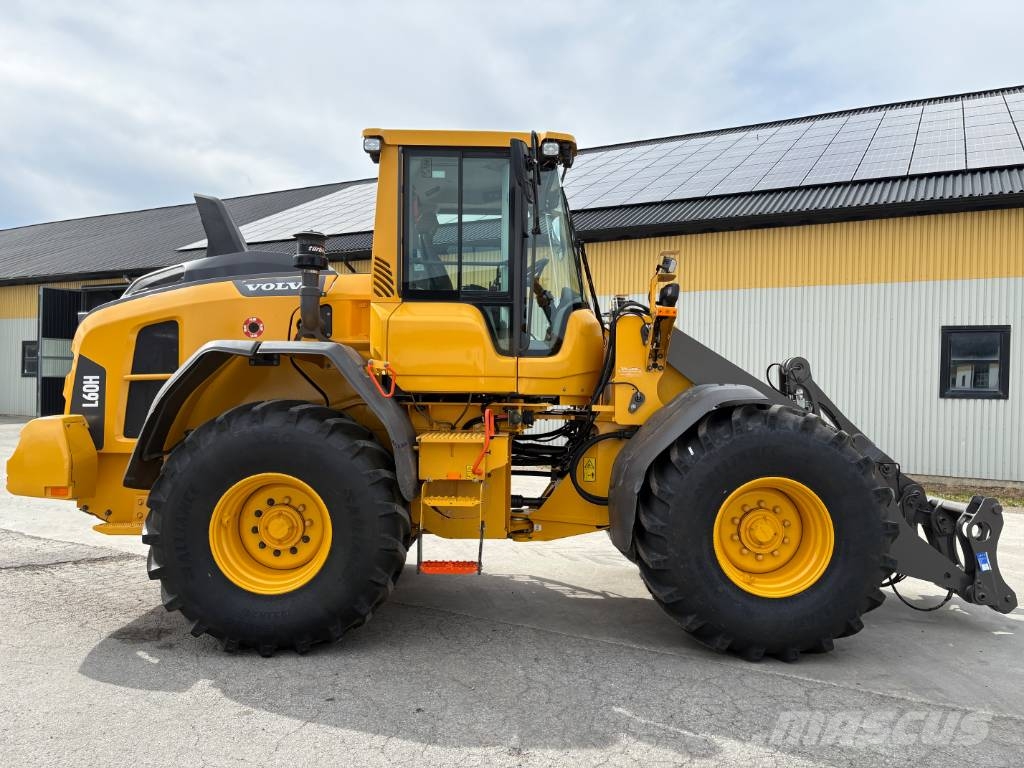 Volvo L60H lastmaskin, nya traktordäck, long boom Фронтальні навантажувачі