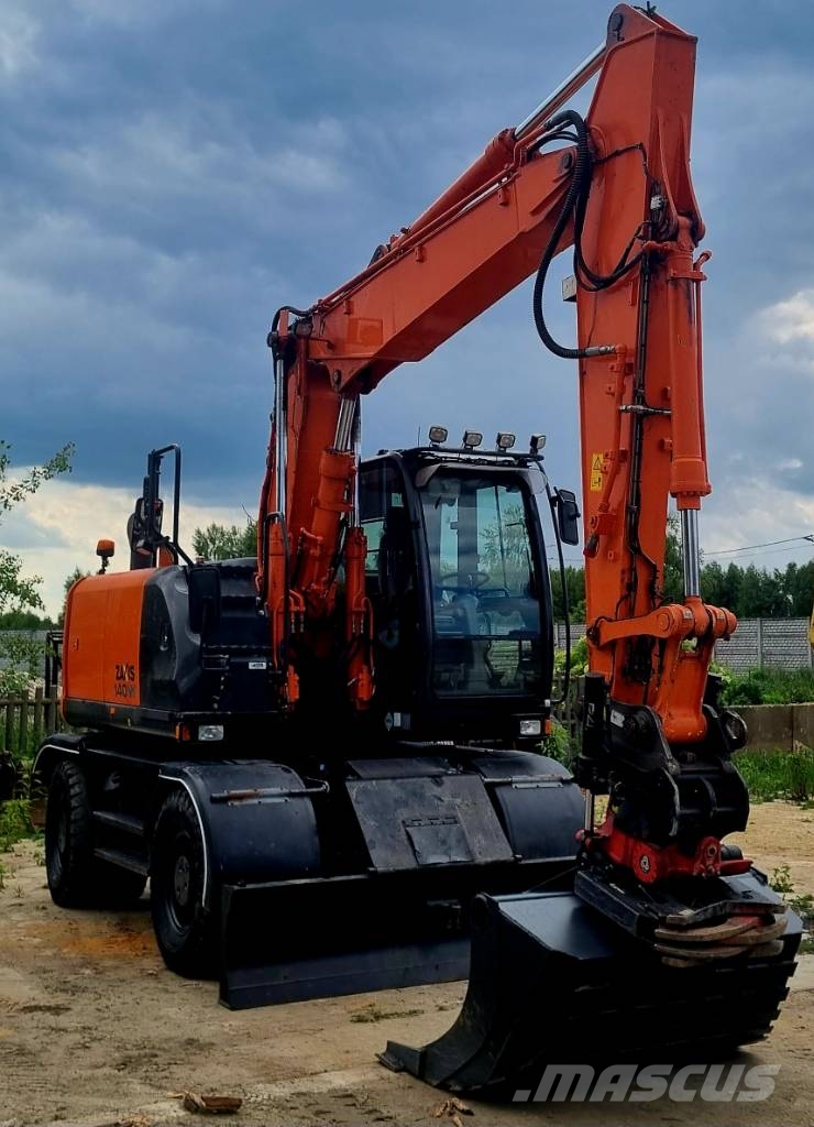 Hitachi 140W حفارات بعجل