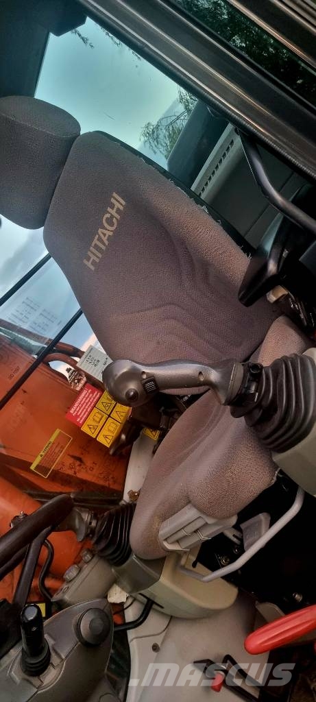 Hitachi 140W حفارات بعجل