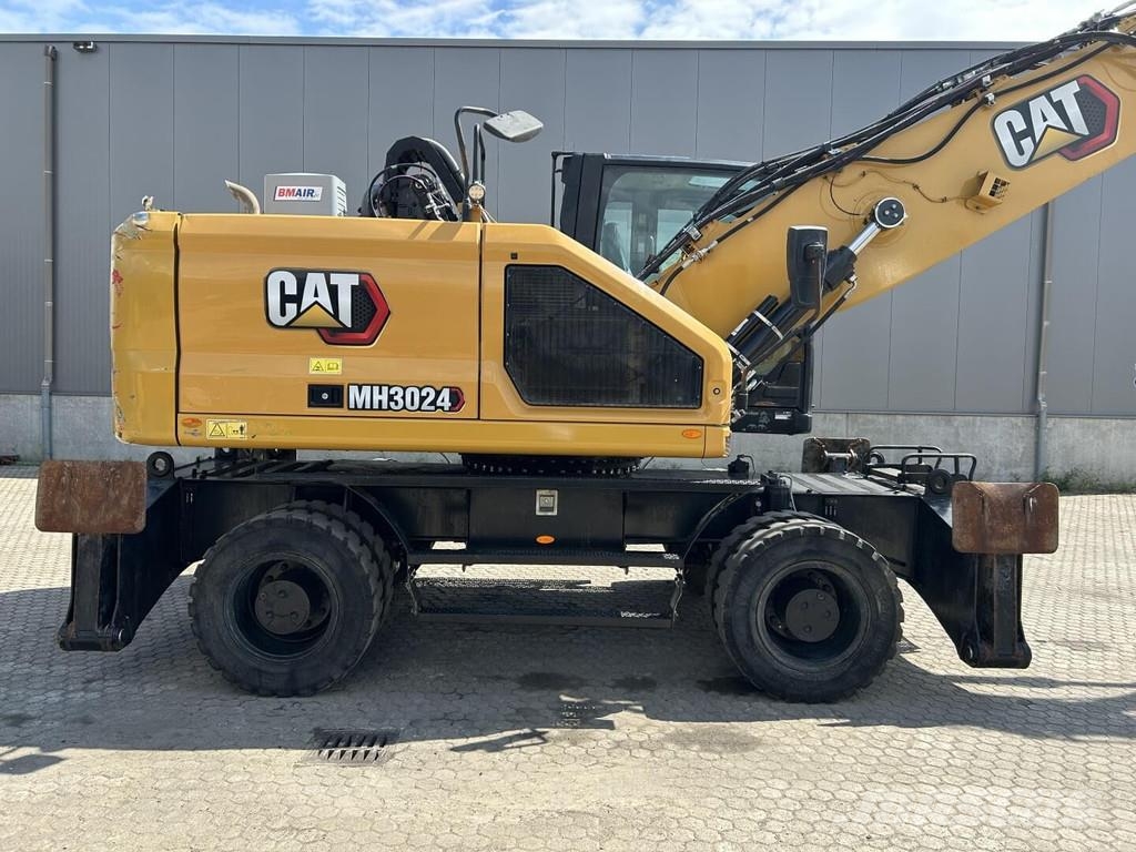 CAT MH3024-07 Bagri za prekladanje primarnih/sekundarnih surovin