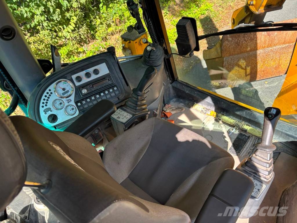 JCB 4 CX لوادر ذات جرافات عكسية