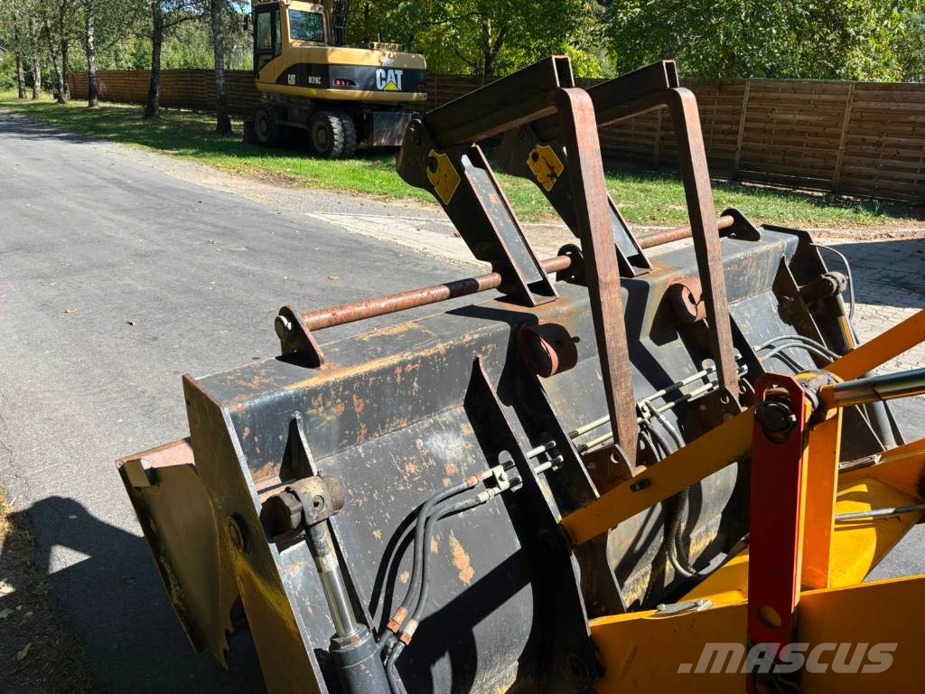JCB 4 CX لوادر ذات جرافات عكسية