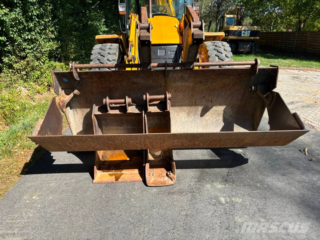 JCB 4 CX لوادر ذات جرافات عكسية