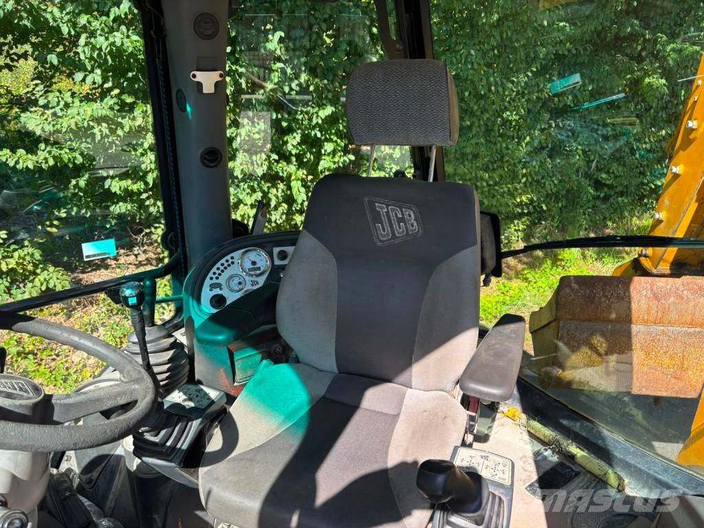 JCB 4 CX لوادر ذات جرافات عكسية