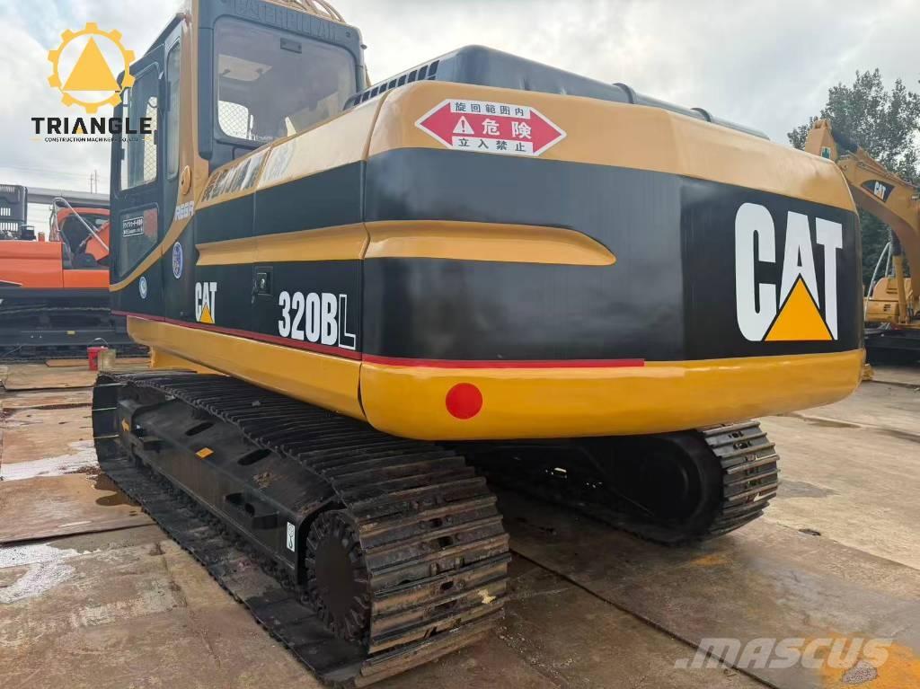 CAT 320 B L Гусеничні екскаватори