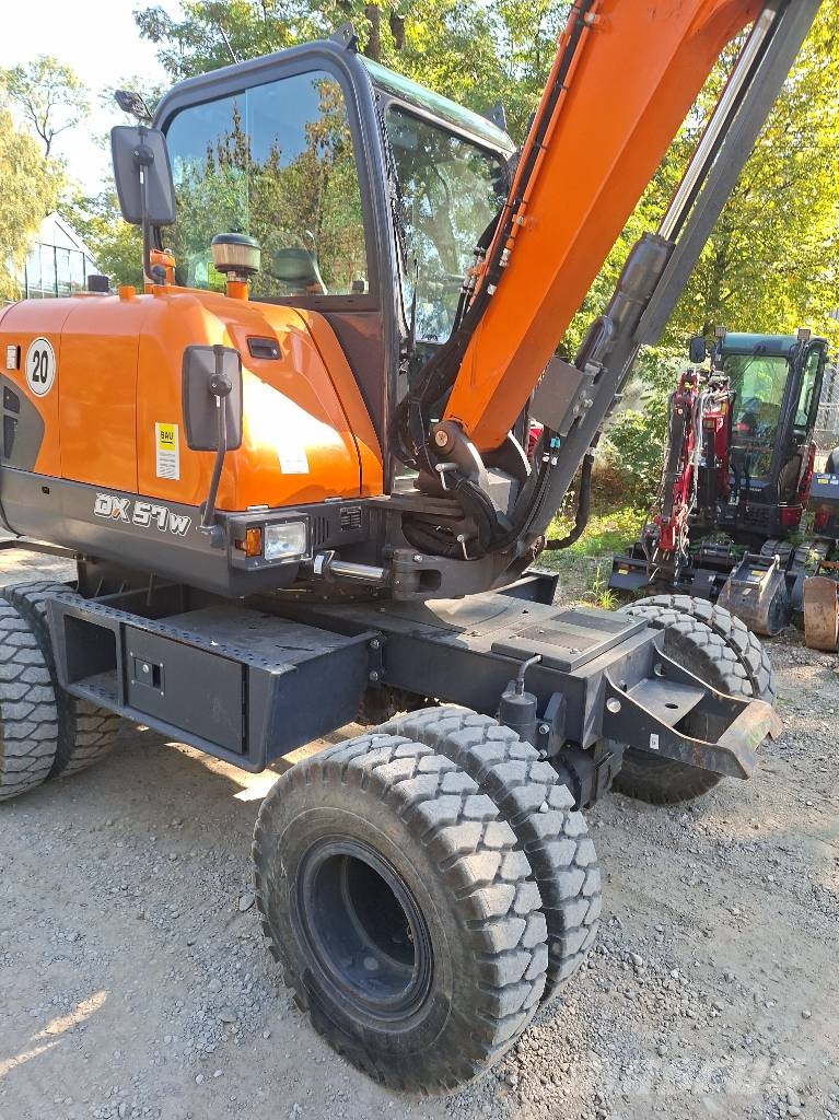 Develon Mobilbagger DX 57 W-7 Bagri na kolesih