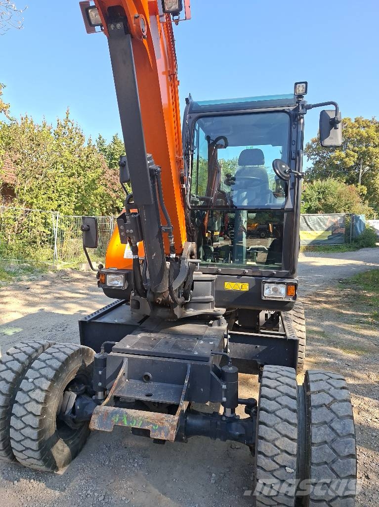 Develon Mobilbagger DX 57 W-7 Bagri na kolesih