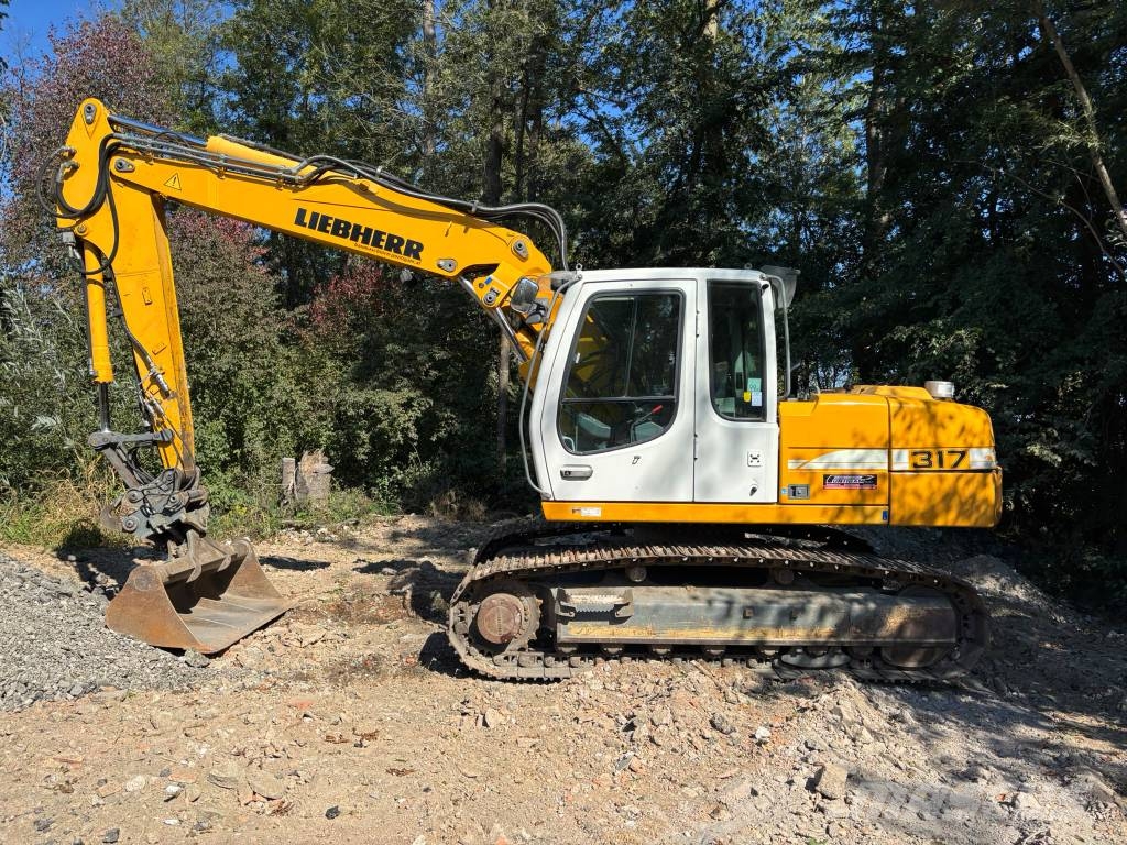 Liebherr R 317 Bageri guseničari