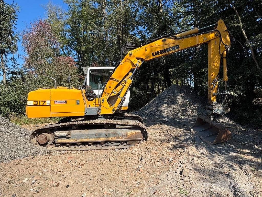 Liebherr R 317 Bageri guseničari