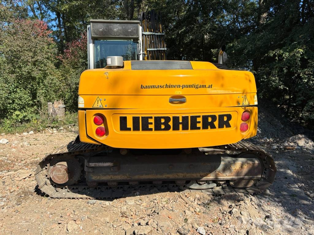 Liebherr R 317 Bageri guseničari