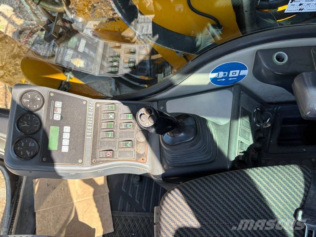 Liebherr R 317 Bageri guseničari