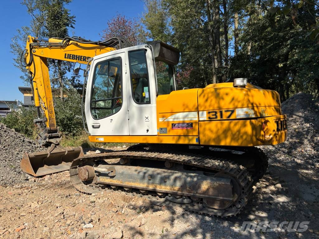 Liebherr R 317 Bageri guseničari