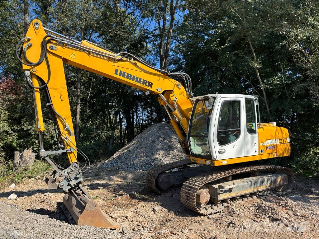 Liebherr R 317 Bageri guseničari