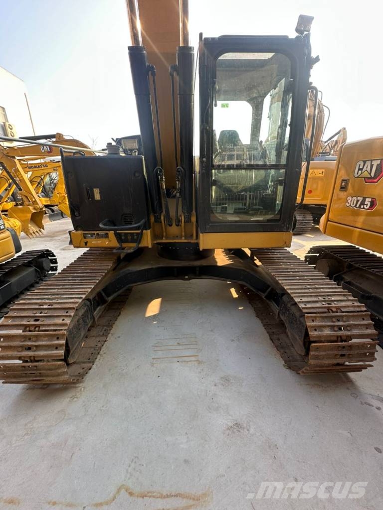 CAT 310 Гусеничні екскаватори