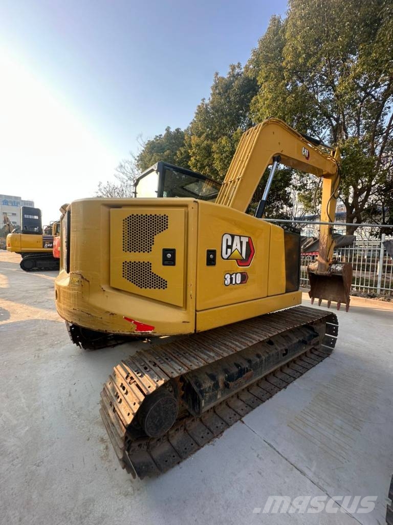 CAT 310 Гусеничні екскаватори