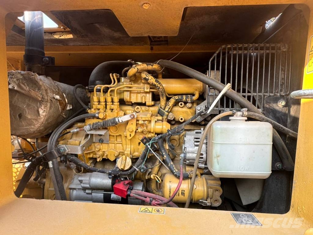 CAT 310 Гусеничні екскаватори