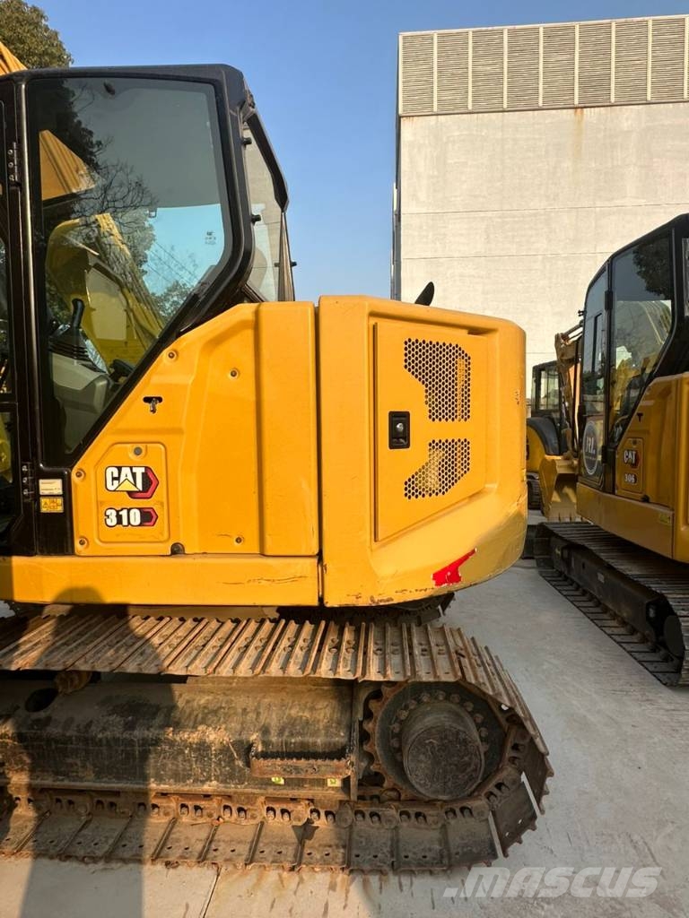 CAT 310 Гусеничні екскаватори