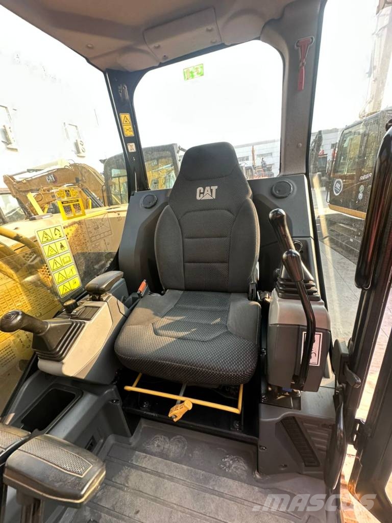 CAT 310 Гусеничні екскаватори