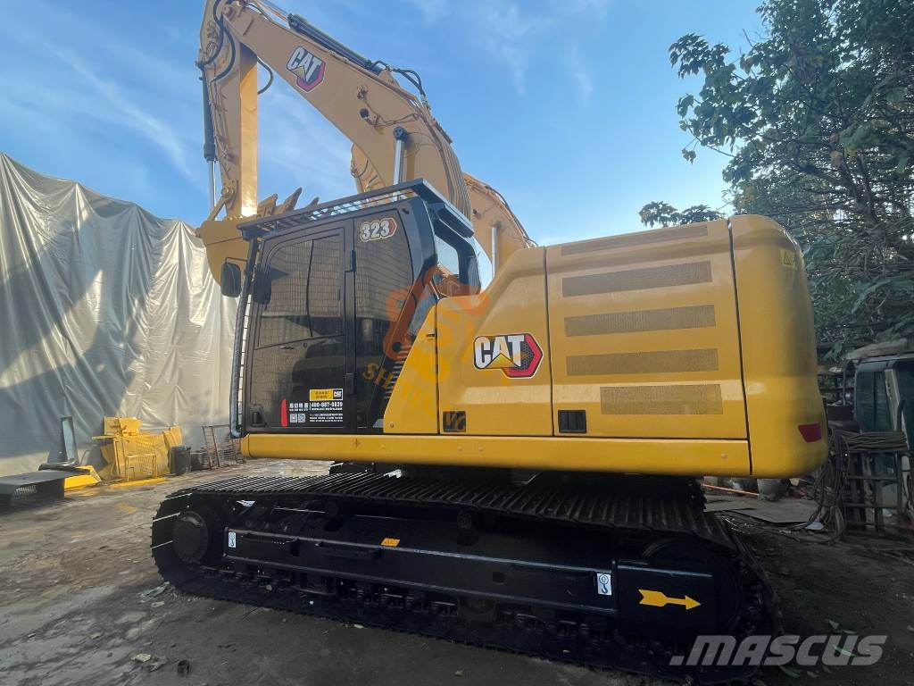 CAT 323 Гусеничные экскаваторы