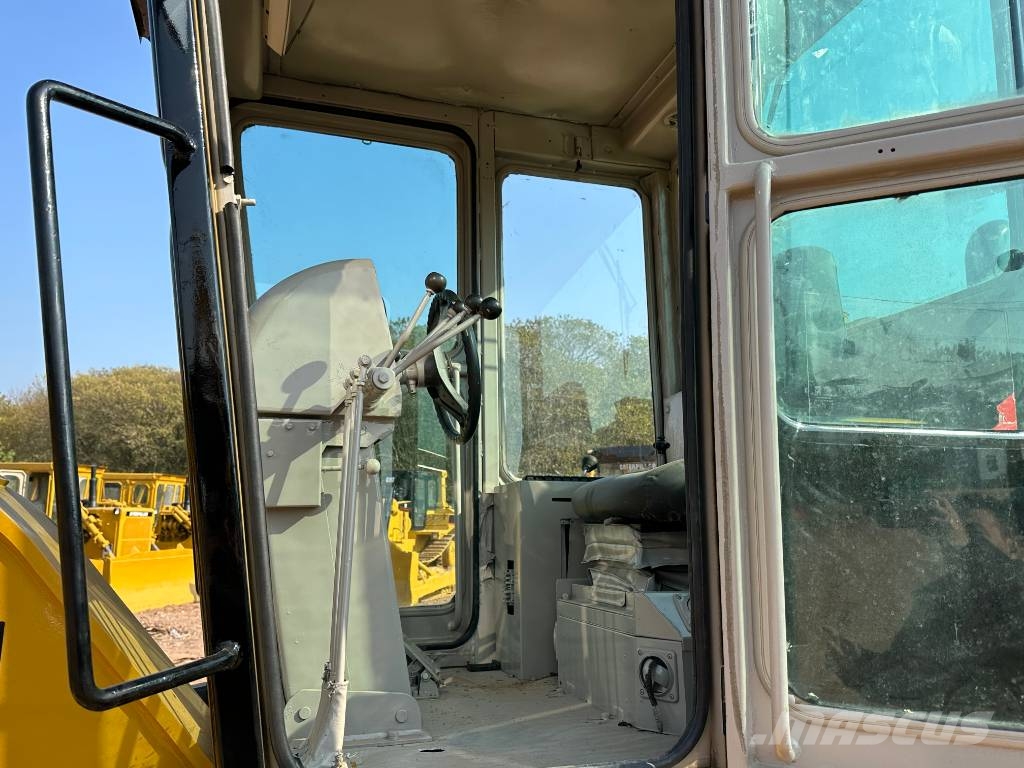 CAT 140H Grederji