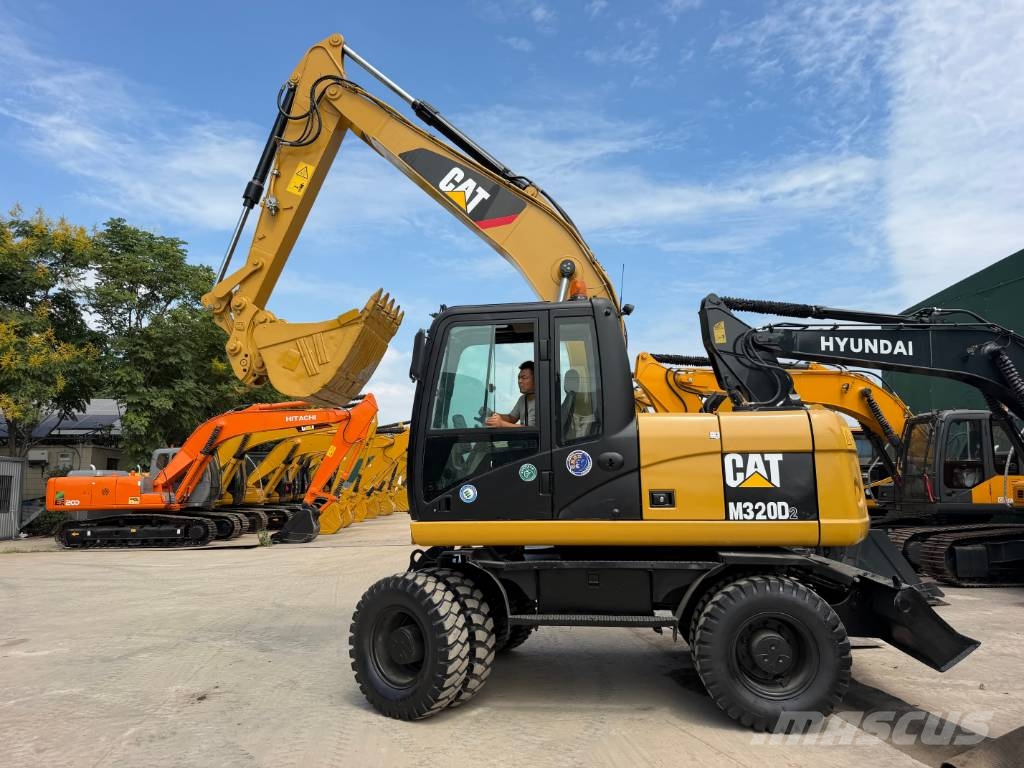 CAT M320D2 CAT wheeled excavator Bagri na kolesih