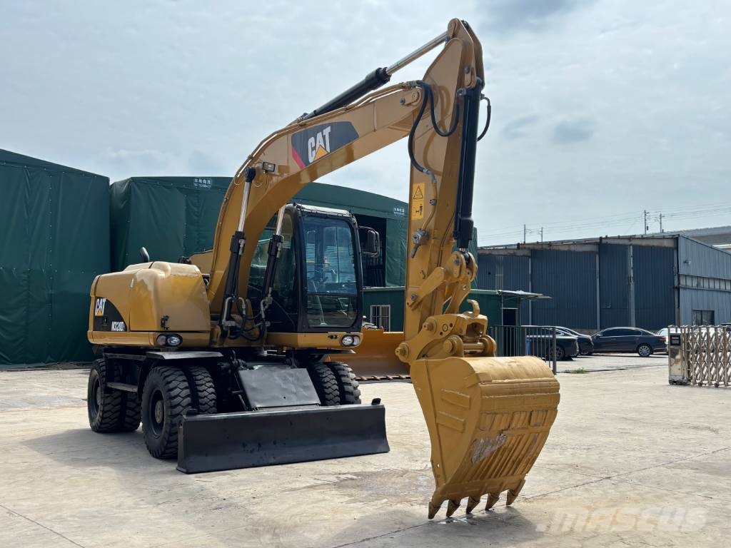CAT M320D2 CAT wheeled excavator Bagri na kolesih
