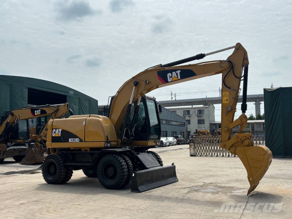 CAT M320D2 CAT wheeled excavator Bagri na kolesih
