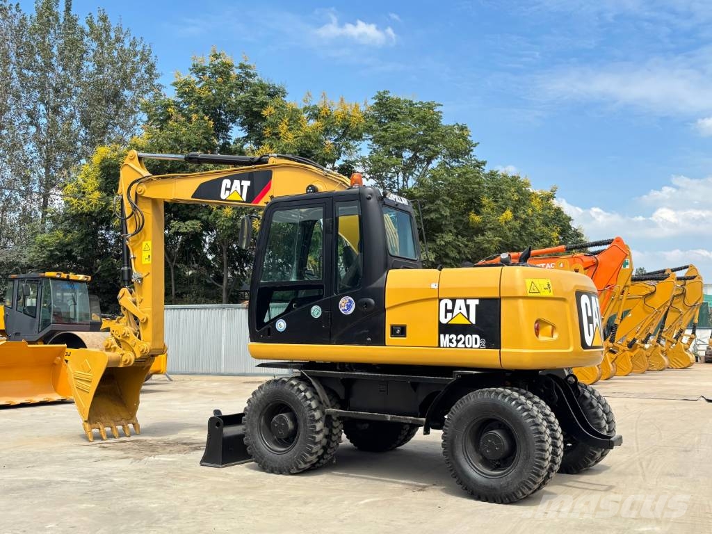 CAT M320D2 CAT wheeled excavator Bagri na kolesih