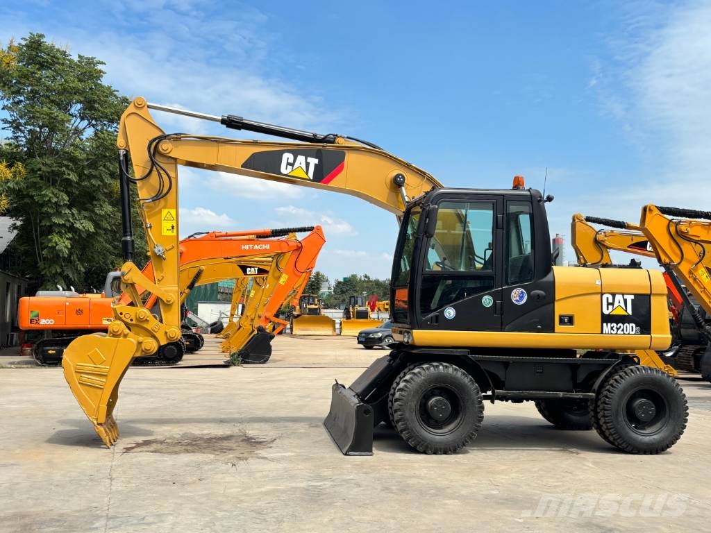 CAT M320D2 CAT wheeled excavator Bagri na kolesih