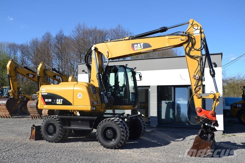 CAT CAT M 315 D Колісні екскаватори
