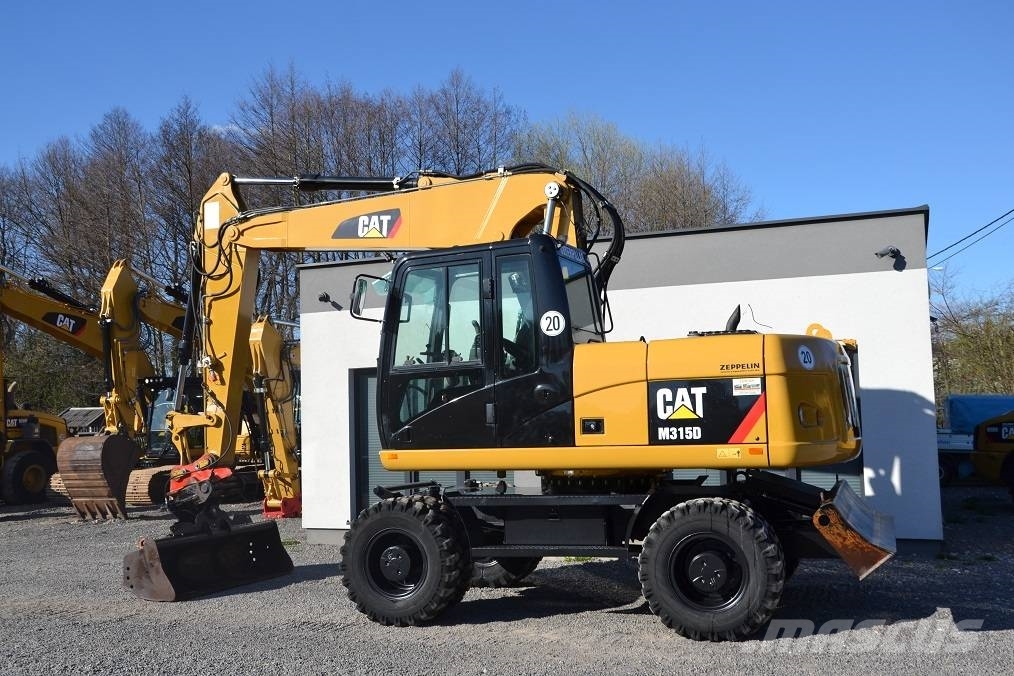 CAT CAT M 315 D Колісні екскаватори