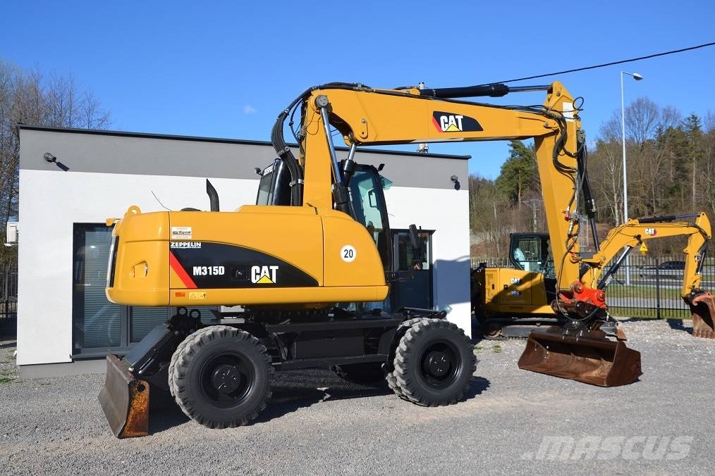CAT CAT M 315 D Колісні екскаватори