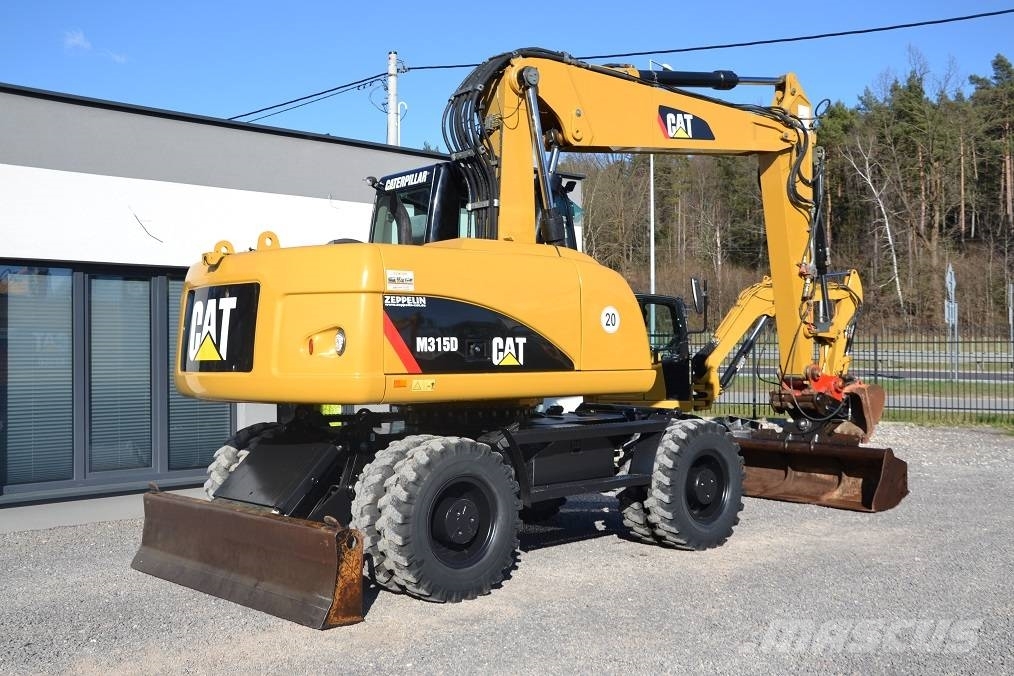 CAT CAT M 315 D Колісні екскаватори