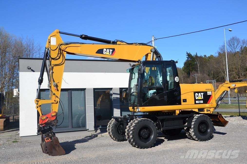 CAT CAT M 315 D Колісні екскаватори