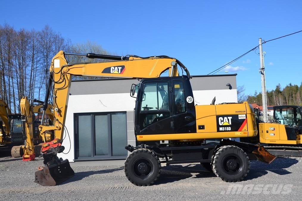 CAT CAT M 315 D Колісні екскаватори