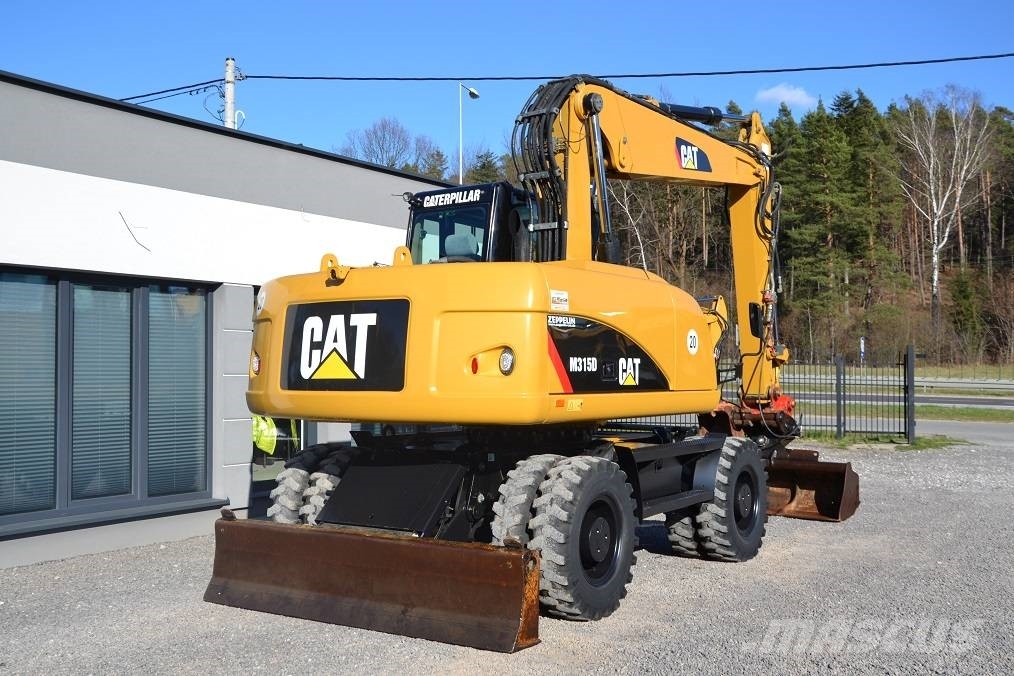 CAT CAT M 315 D Колісні екскаватори
