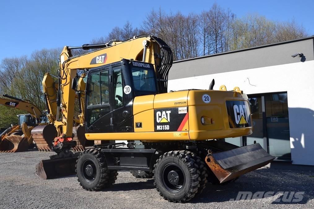 CAT CAT M 315 D Колісні екскаватори