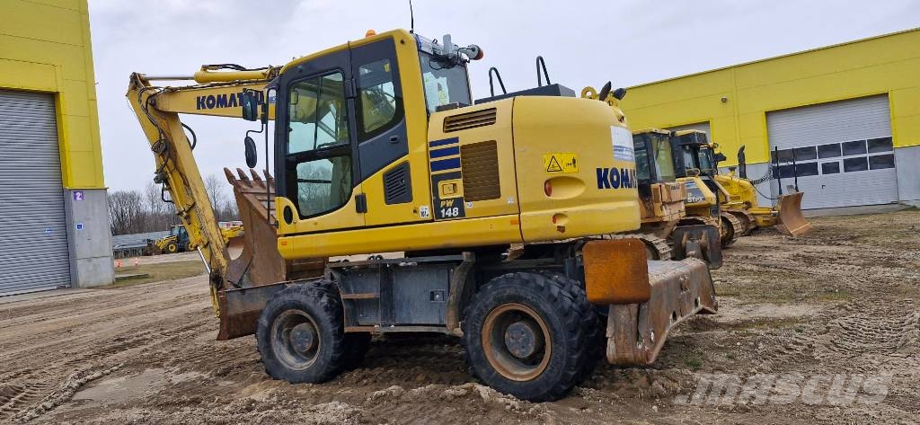 Komatsu PW148 - 10 حفارات بعجل