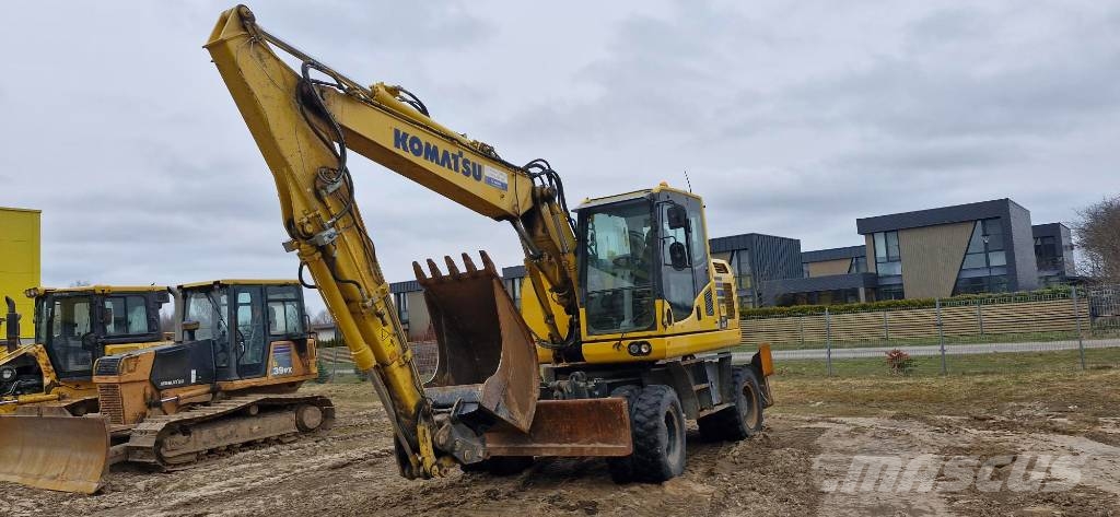 Komatsu PW148 - 10 حفارات بعجل