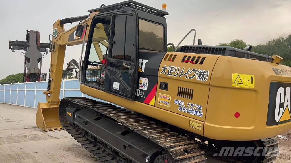 CAT 323D2L Midigraafmachines 7t - 12t