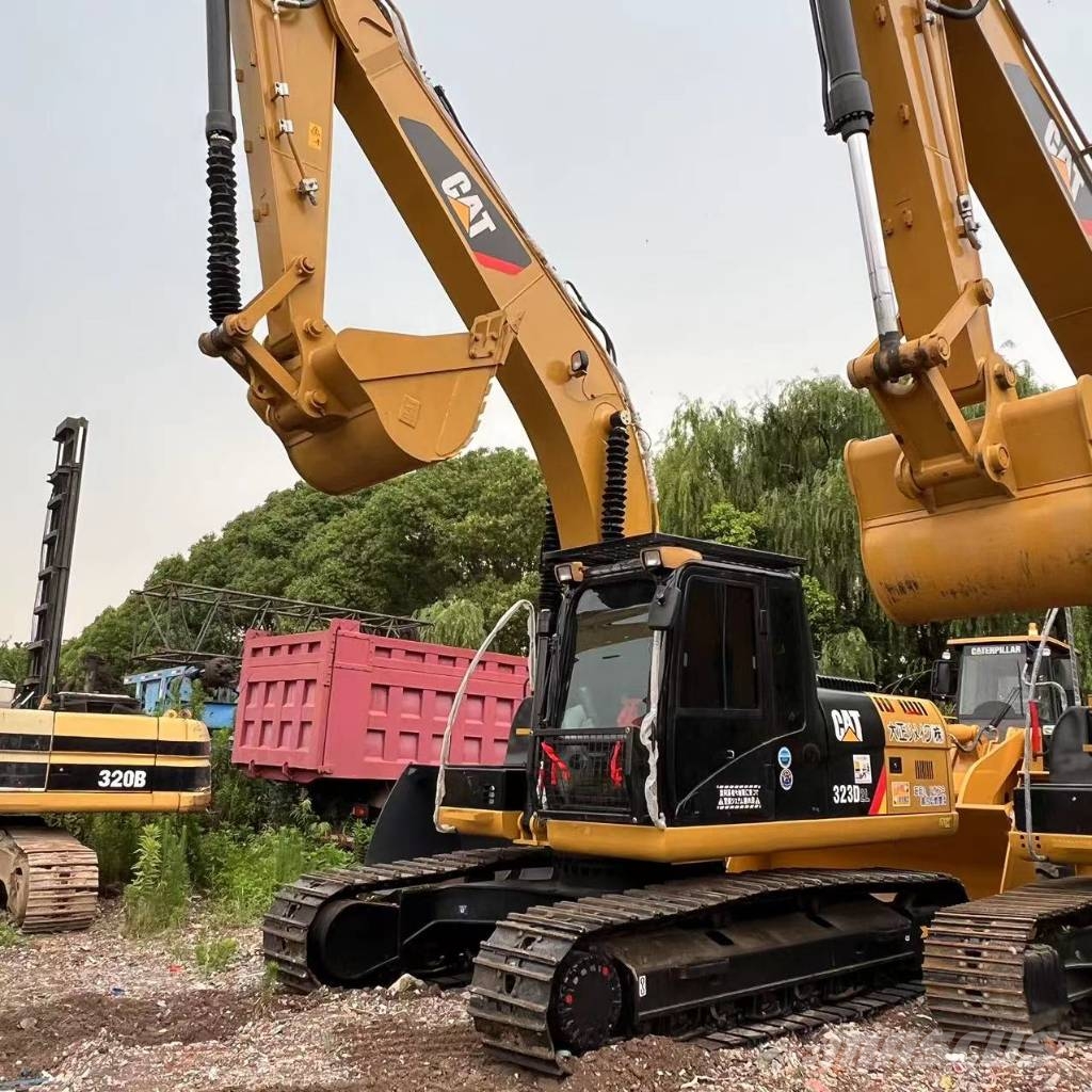 CAT 323D2L Midigraafmachines 7t - 12t