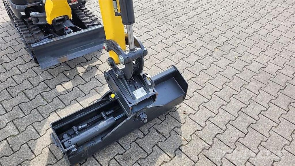 New Holland E12D حفارات بعجل