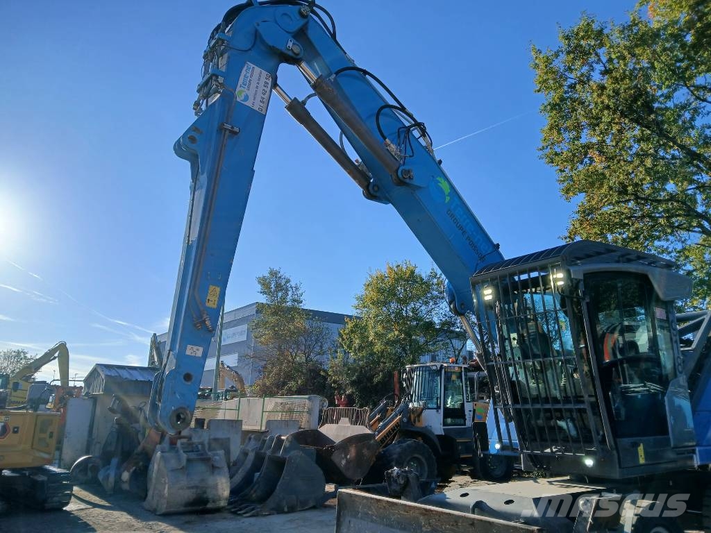 Fuchs MHL 320F Gumikerekes kotrók