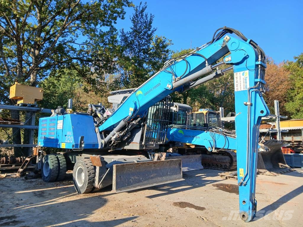 Fuchs MHL 320F Gumikerekes kotrók