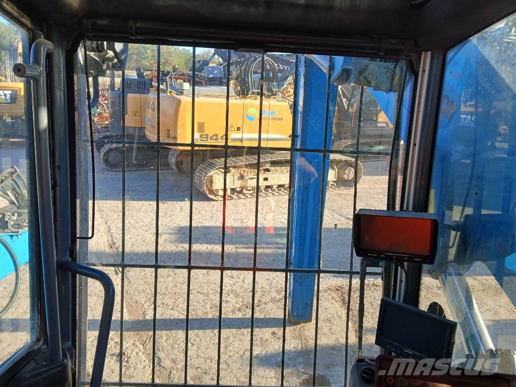 Fuchs MHL 320F Gumikerekes kotrók