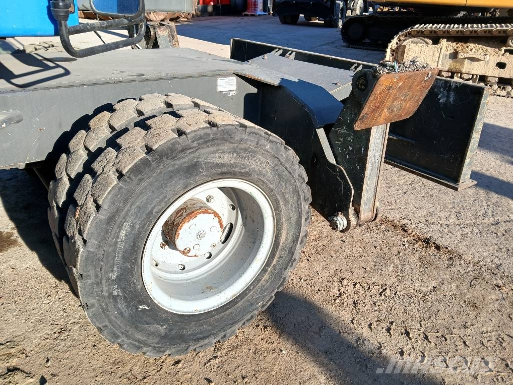 Fuchs MHL 320F Gumikerekes kotrók