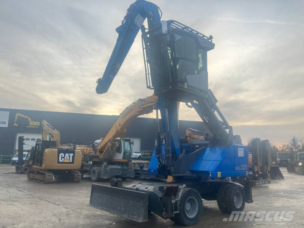 Fuchs MHL 320F Gumikerekes kotrók